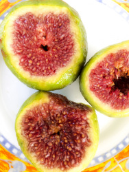 three sliced fresh figs are ready to relish it