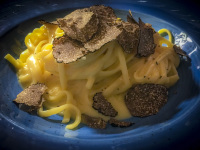 delicious pasta with truffle slices on the top