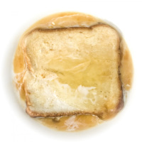 second part of preparing french toast with egg, milk and toast