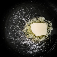 for the third part of preparing french toast to melt butter in a pan