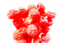 fresh ruspberries in a shiny white light