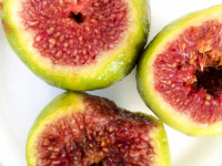 three sliced fresh figs are ready to relish it