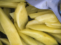 for garlic potatoes the potatoes with garlic sear in butter - don\'t forget to turn it!