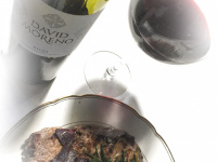 a steak with rosemary, onions and green beans in combination with spanish red wine of david moreno