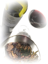 a steak with rosemary, onions and green beans in combination with spanish red wine of david moreno