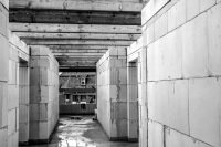a not yet ready builded house while a topping out ceremony, black-and-white