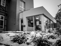 the entrance hall of the medical care center in hermannsburg in lower saxony in wintertime, black-and-white