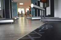 a fitness studio with fitness equipment in worm\'s eye view