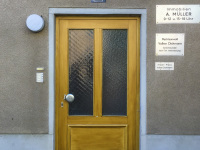 an old wooden front door in the film backdrop of the german tv series lindenstraße in cologne