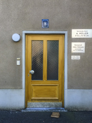 an old wooden front door in the film backdrop of the german tv series lindenstraße in cologne