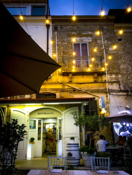 the nice illuminated outdoor area of the taverna del duca in bovino in puglia