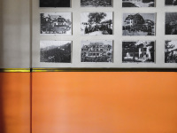 old black-and-white pictures of the elafos hotel on rhodesin the hall of the hotel