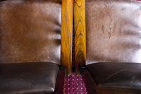 brown leather armchairs with wooden armrests in the elafos hotel on rhodes