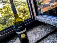 a bottle primitivo di manduria at the window in the residenza ducale in bovino in puglia