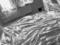 renovation work that looks like the art of the artist christo, black-and-white
