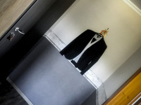 in the hotel wernerwald near cuxhaven is hanging a jacket in the corridor of a room