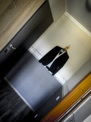 in the hotel wernerwald near cuxhaven is hanging a jacket in the corridor of a room