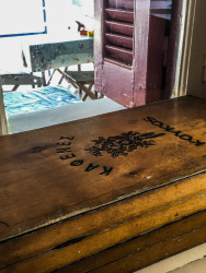 an old wooden backgammon at the window of the tavern attaviros in agios isidoros on rhodes