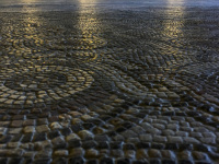 a hall of the grandmaster palace in rhodes city with cozy lights and stony mosaik floor