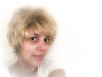 self-portrait with soft focus and a wig with blond short hairs