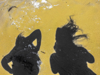shadow self-portrait with best friend at the beach