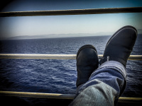 self-portrait of my best sendra boots at a ship railing