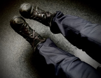 self-portrait with blue pants and black boots