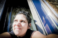 self-portrait at a wooden window and blended by the sun