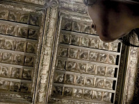 self-portrait from underneath with a historical wooden ceiling