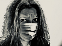self-portrait with skepticism and corona mask, sepia