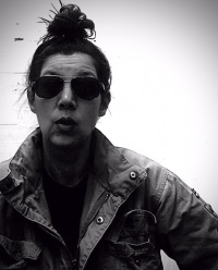 self-portrait with parka and sunglasses, black-and-white