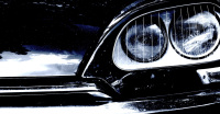 car headlight of an black citroen d2