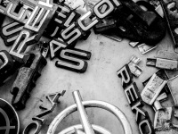 a collection of signs of opel oldtimer like ascona or rekord, black-and-white
