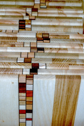 little wooden boards with a nice design are lined up in a line