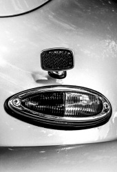 the taillight of the oldtimer porsche 356, black-and-white