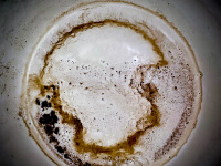 many light brown and dark brown nuances are in this coffee grounds