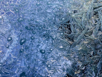 nice ice flowers on the windshield of am black bmw e60