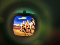 through a peep mini television you see the picture of the three magi