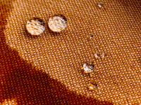 round waterdrops on a brown towel