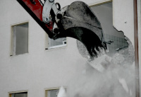 a demolition crane tears off a wall of a house in bergen in lower saxony