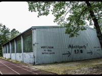 an old gym in unterlüß is lettering with the date of the party for her demolition