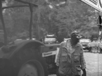 on an oldtimer meeting in hermannsburg an old man and a tractor are reflected in the shiny bodywork of an oldtimer