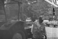 on an oldtimer meeting in hermannsburg an old man and a tractor are reflected in the shiny bodywork of an oldtimer