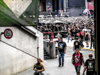 some musicfans at the exit of an iron maiden concert in the rhein-energie-stadion in cologne
