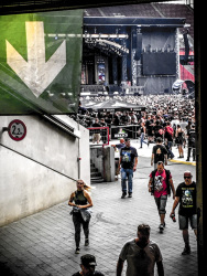 some musicfans at the exit of an iron maiden concert in the rhein-energie-stadion in cologne