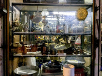 the shop window of a shop with antique stuff in the old town in ioannina