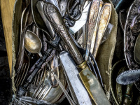 nice old knifes, spoons and forks in silver are for sale at the antique market in monastiraki in athens