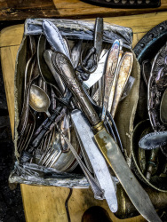 nice old knifes, spoons and forks in silver are for sale at the antique market in monastiraki in athens