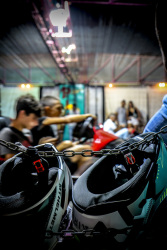 behind two helmets teenager are driving autoscooter on a funfair in kremasti on rhodes