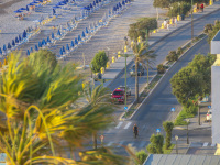 view from above to the promenade of akti kanari near monte smith in rhodes with the beach and the street